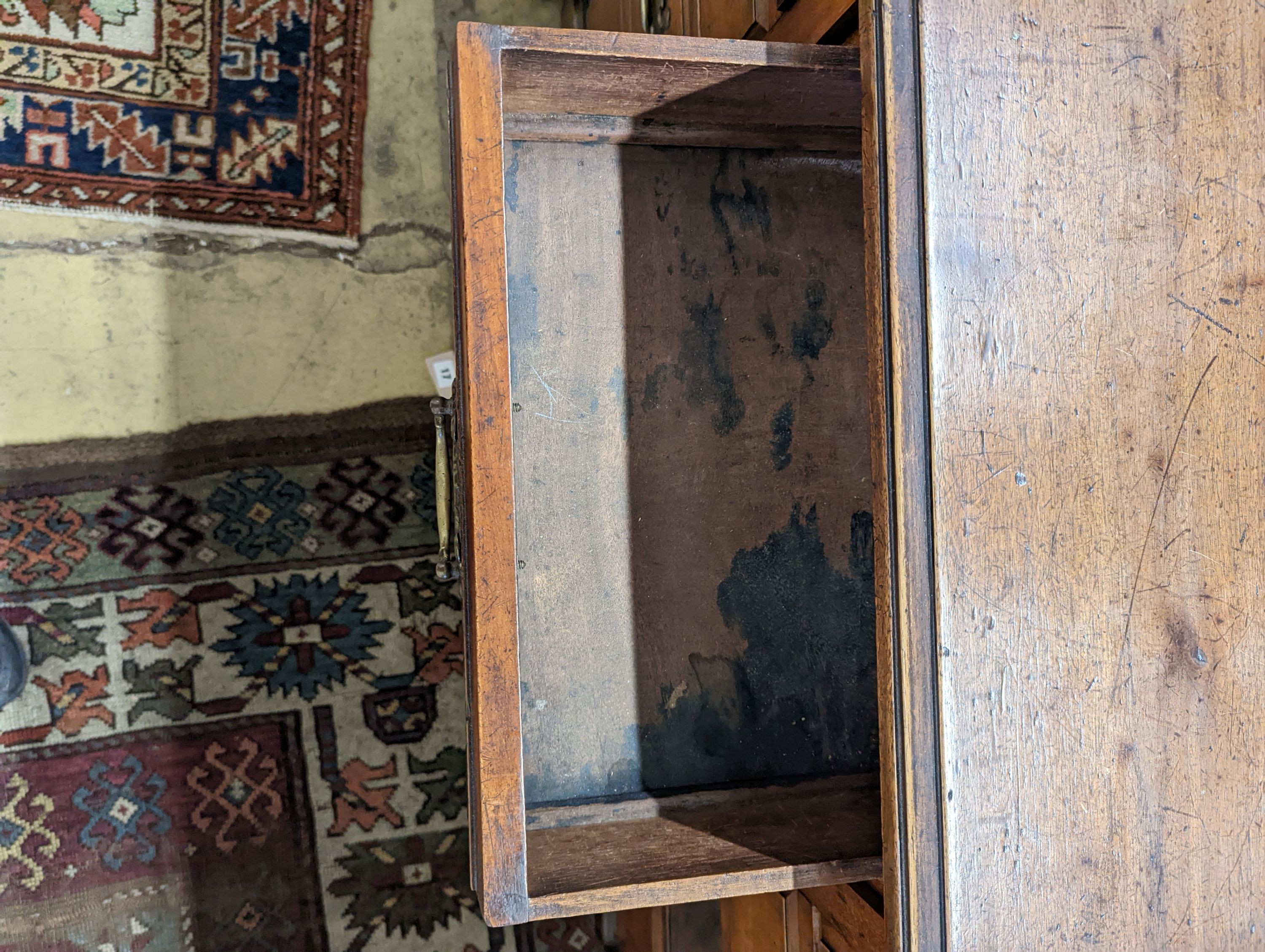 A late Victorian mahogany walnut kneehole desk, length 114cm, depth 55cm, height 78cm